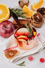 Hot mulled wine with fruits and spices. Autumn or winter warm drink