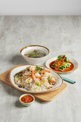 traditional chinese set seafood fried putian noodle with dumpling dim sum bao and soup snack...