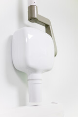 Vertical photo of a dental X-ray appliance. Intraoral high-frequency X-ray machine. X-ray stomatology to create a dental image. Equipment for panoramic imaging of the human jaw.