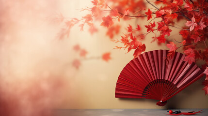 Traditional Japanese fan with red autumn leaves, fall vibes background
