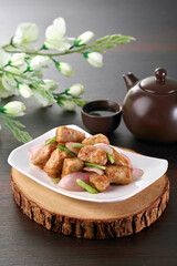 traditional chinese fresh vegetable wok stir fried mixed veggies yam soya sauce in clay pot on grey vintage background asian cafe hotel luxury halal vegan food restaurant banquet menu