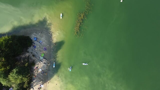 fun at the lake, sup boards, swimming at the beach,  from drone