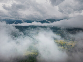 Cloudy weather in Zakopane Poland, view of the city and Mount Giewont from a drone.