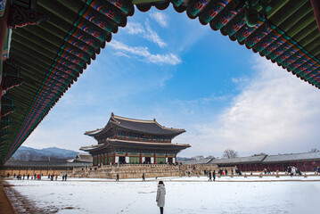 Snow falls in winter at Gyeongbokgung Palace, Seoul, South Korea.	