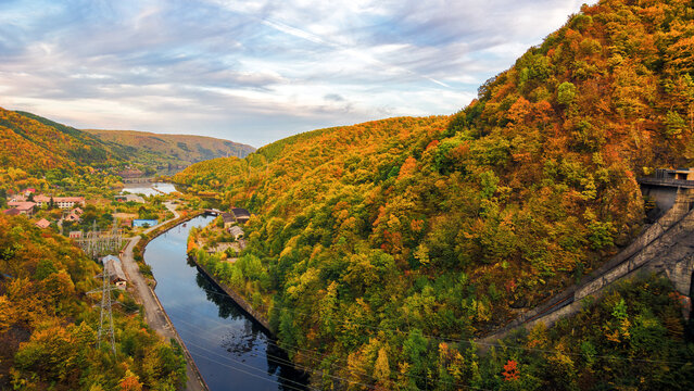 river flows among the forested area of carpathian mountains. autumnal countryside tourism background