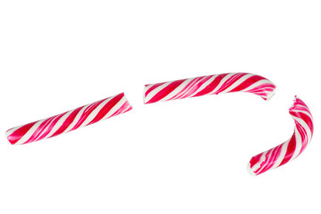Obraz premium Broken candy cane isolated on white background.Top view