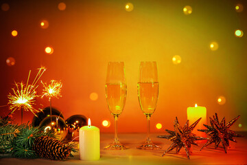 New Year greeting card with champagne and decorations on the table