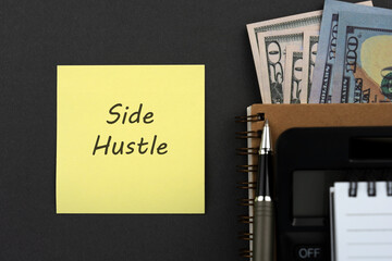 Side hustle text on adhesive note