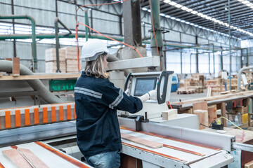 Wood mechanic inputs data, automates machines for cutting, laser, saw, milling, lathe in factory