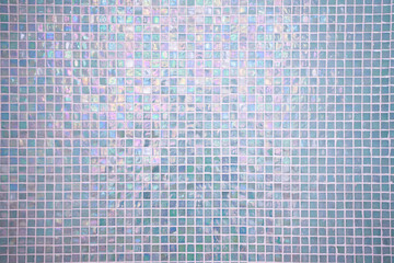 Pastel blue mosaic texture background, decorative tile wall