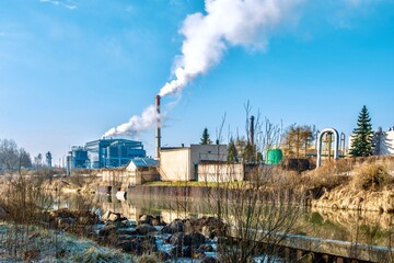 Industrial landscape with a sugar factory on the banks of the Wisłoka River in Jaslo, Poland.