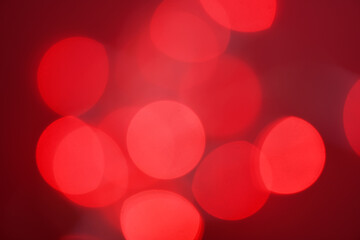 Red light bokeh for holiday lights background or Christmas background