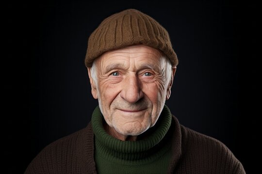 Portrait of a satisfied elderly man in his 90s donning a warm wool beanie against a white background. AI Generation