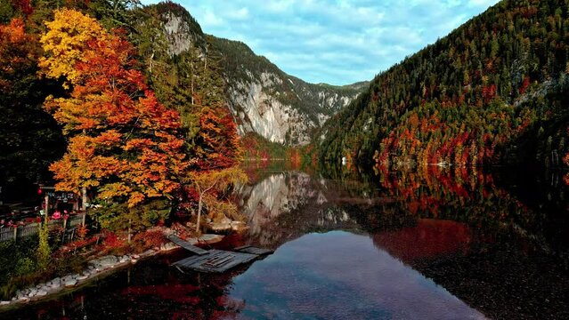 Mirrored Reflections Of Autumn Forests And Mountains On Calm Lake Toplitz In Austria. zoom-in