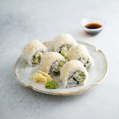 Homemade sushi rolls with crab meat and avocado