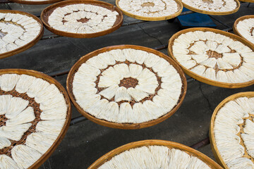 Close-up of traditional handmade noodle-making drying outdoors in Guanmiao, Tainan, Taiwan.