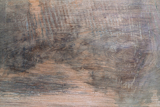 Image of aged rustic hardwood grain plank deep rough background. Old grunge dark textured wooden backdrop. Surface of retro dark brown wood desk furniture or floor material wallpaper. Nature wooden.