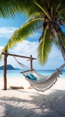 relaxing in wicker hammock on the sandy beach on Mauritius coast and enjoying wide ocean view waves. Exotic countries vacation and mental health concept image.