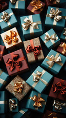 Gift boxes in blue and gold colors on a dark background.