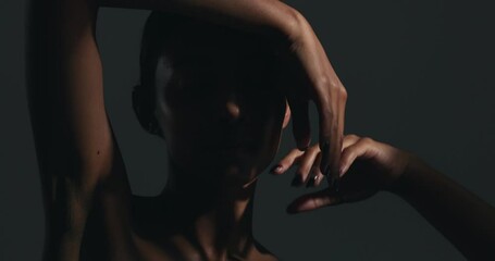 Beauty, sensual and face of woman in a studio with body care, wellness and health routine. Cosmetic, movement and portrait of an Indian female model with glowing skin treatment by a black background. - Powered by Adobe