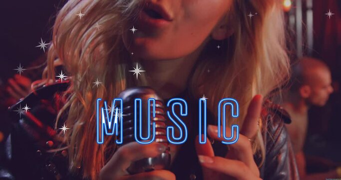 Animation of neon music text banner and stars icons over caucasian female singer singing at concert