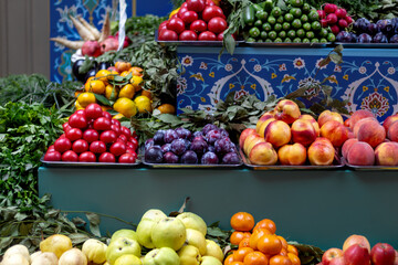 Ripe fruits and vegetables on market counter