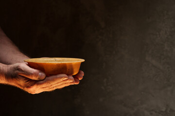 Empty bowl on dark background with copy space