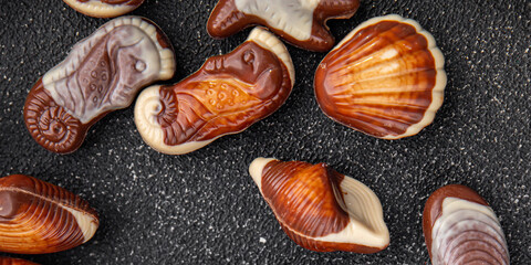 seashells candy chocolate sweet dessert eating meal food snack on the table copy space food background rustic top view