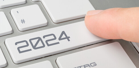 A keyboard with a labeled button - 2024