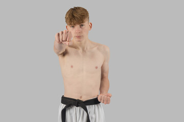 Shirtless Male Teenage Karate Black Belt