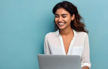 Young woman standing with laptop 
isolated on background
