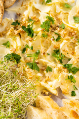 Butter board with vegetables and bread