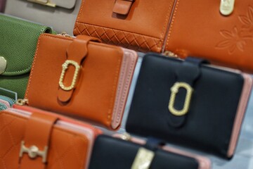 wallets and purses at a market.