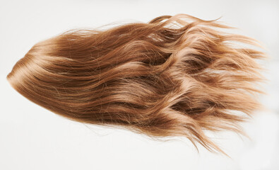 Natural looking shiny hair, brown curls isolated on white background with copy space