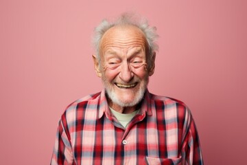 Portrait of a joyful man in his 80s wearing a comfy flannel shirt against a solid color backdrop. AI Generation