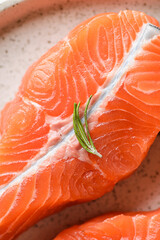 raw salmon medallions with lemon