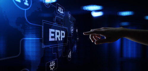 ERP Enterprise Resources planning software system business process automation concept. Hand pressing button on screen.