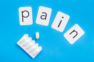 Rectal suppositories for pain relief. Medical treatment concept