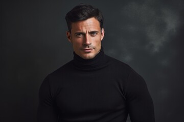 Naklejka premium Portrait of a tender man in his 30s wearing a classic turtleneck sweater against a empty modern loft background. AI Generation