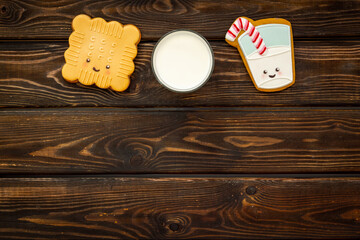 Brekfast with milk and funny cookies, top view. Food for kids