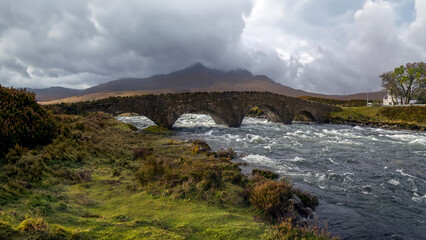 Fototapeta na wymiar The old bridge at Sligachan on the Isle of Skye in the Cuillin Hills in the Inner Hebrides of northwest Scotland.