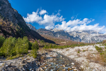 Fototapeta na wymiar blue sky over valley among albania theth national park and mountains
