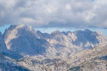 blue sky over valley among albania theth national park and mountains