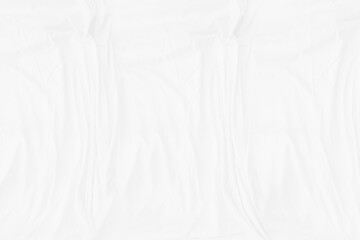 Top view Abstract White cloth background with soft waves.Wave and curve overlapping with different shadow of color,white fabric, crumpled fabric.