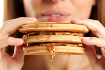 A Woman's Lips Enjoying a Stack of Fluffy Pancakes with Sweet Syrup Drizzle AI generated