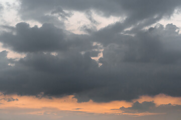 Fototapeta na wymiar evening sky with fluffy rain cloud in soft blurred style.