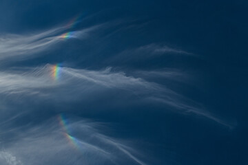 Fire rainbow. Spectacular Iridescent Cloud. A Rare Glimpse of Nature's Prismatic Fire Rainbow....
