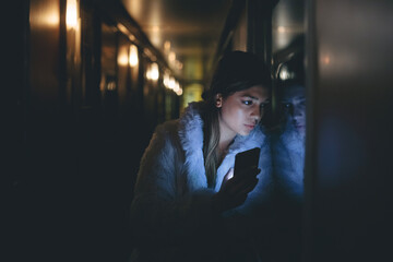 Woman on a hallway on a train
