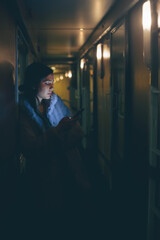 Woman on a hallway on a train