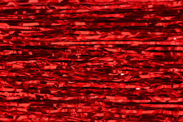 shiny red background from New Year's rain, red foil - obrazy, fototapety, plakaty